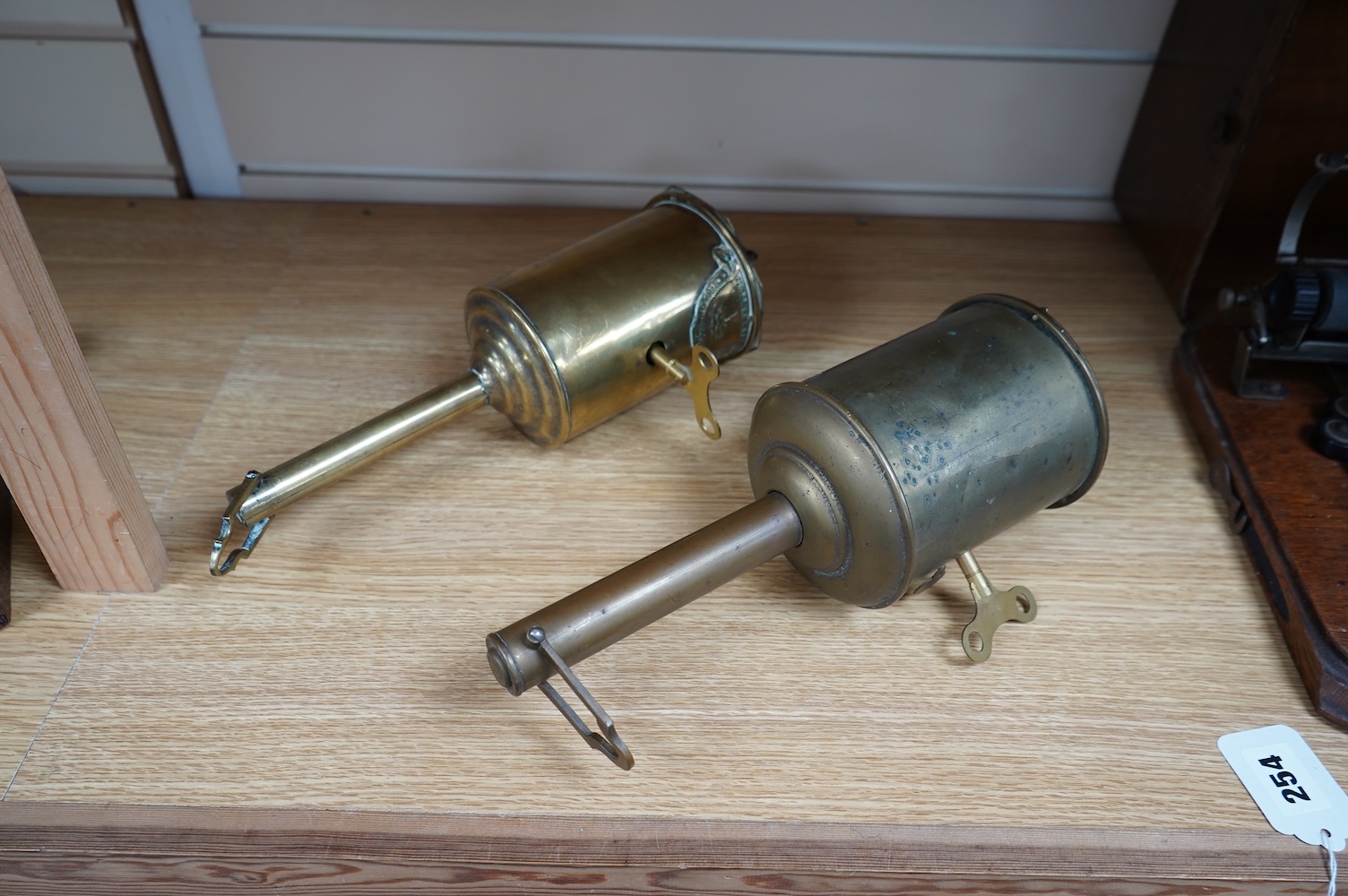 Two early 19th century brass clockwork meat jacks (bottle jacks or spit jacks), one by John Linwood. Condition - fair to good.